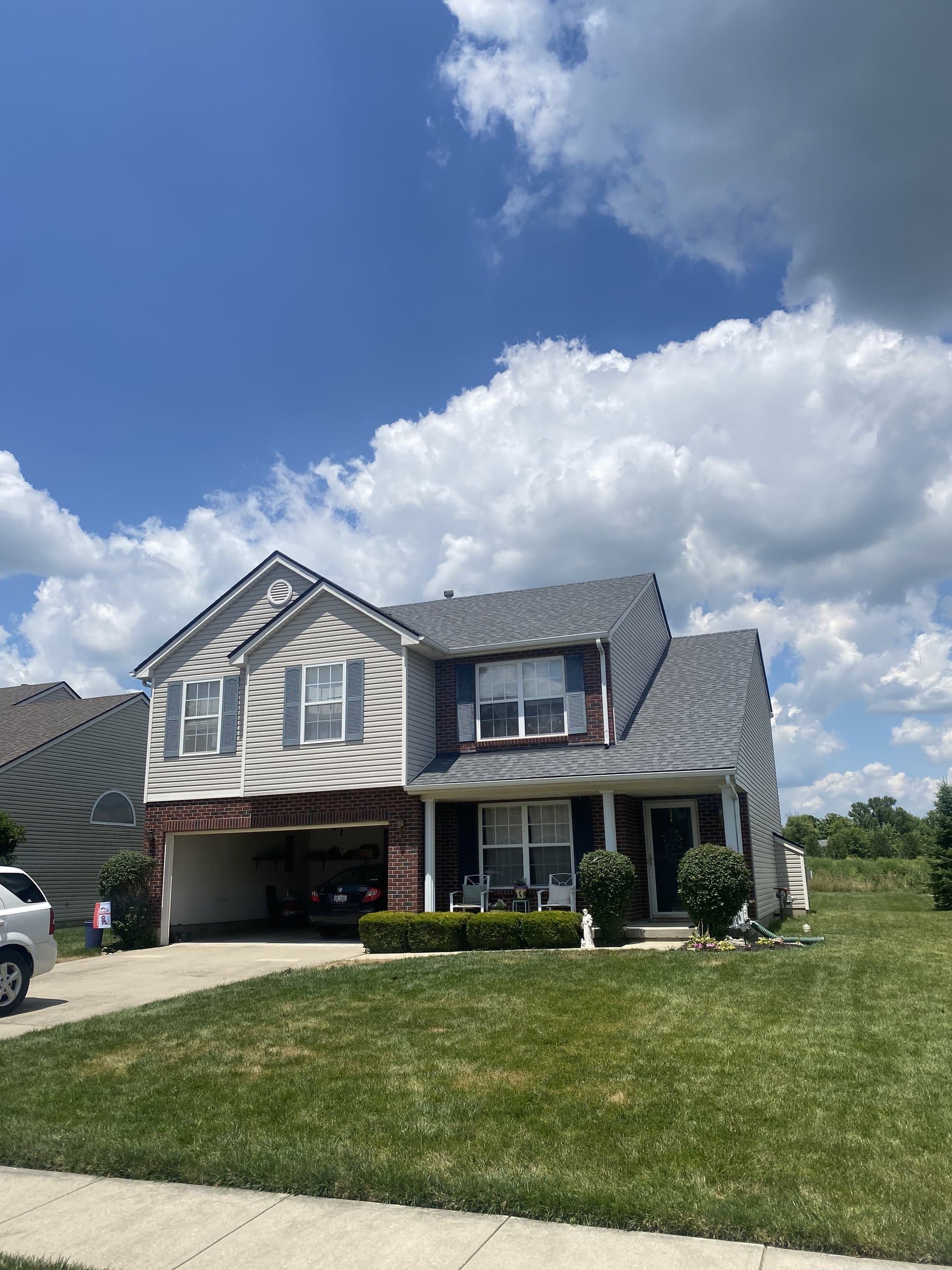 Two-story home with new architectural shingle roof in Dayton, OH