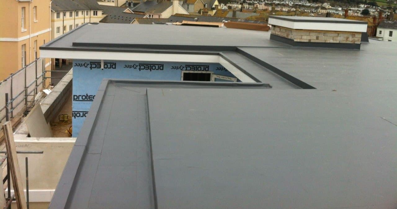 Commercial flat roof TPO membrane installation